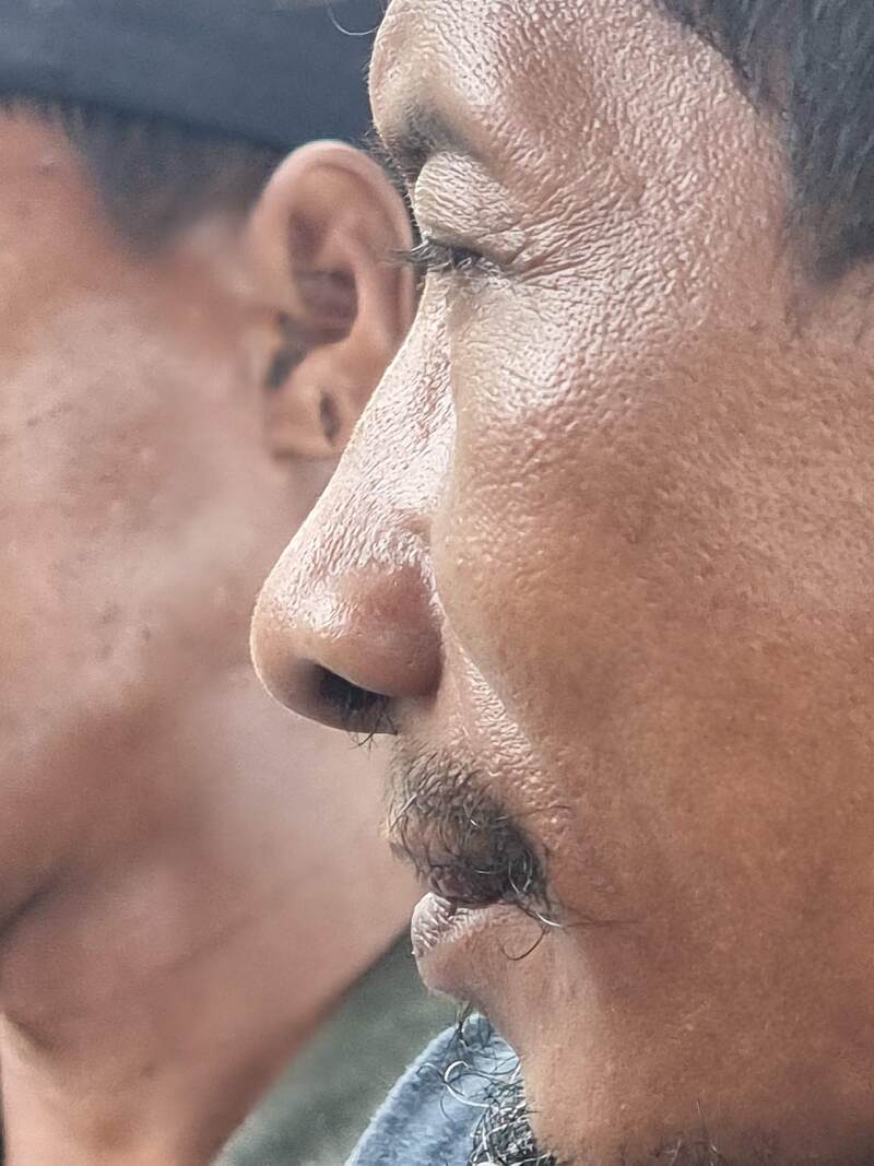 Side-profile portrait of an older man