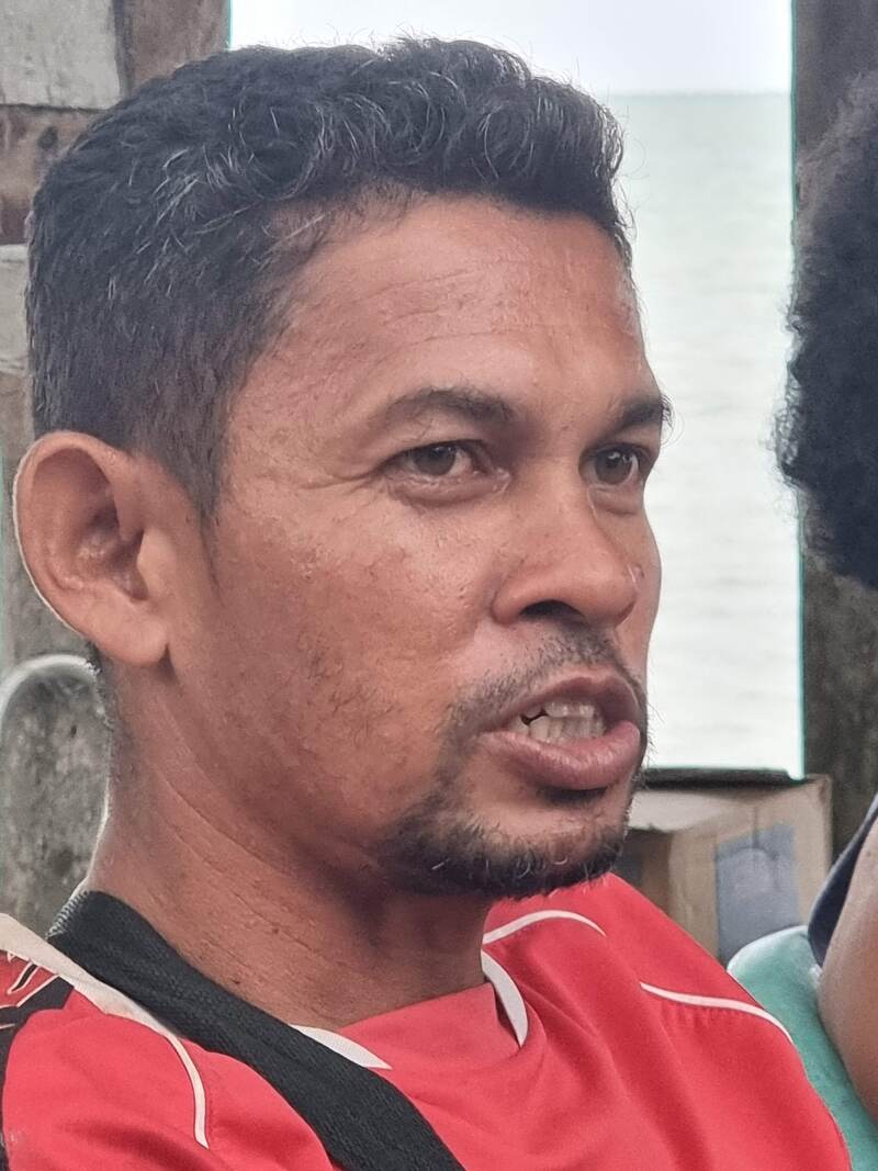Portrait of a man in a red shirt