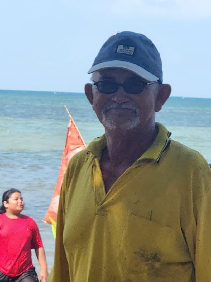 Portrait of a man in a yellow cap
