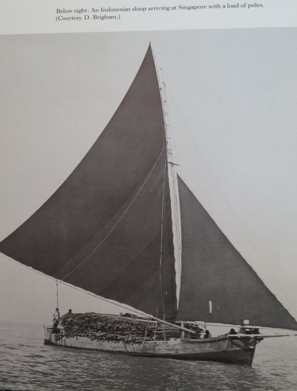 Archival photo captioned 'An Indonesian sloop arriving at Singapore with a load of poles' (courtesy D. Brigham)